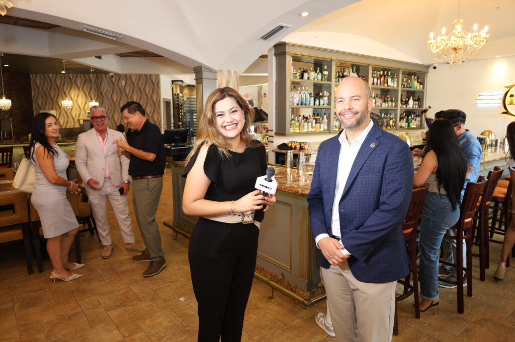 Reporter Sarimar interviewing Manny Cid. Cortadito 305 event supporting profitable entrepreneurship in Miami