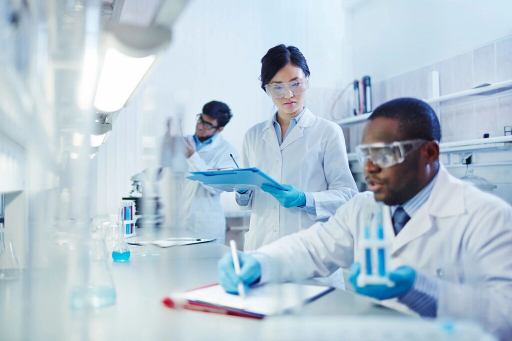 scientists running labs